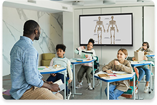 Teachers using OneScreen touchscreen